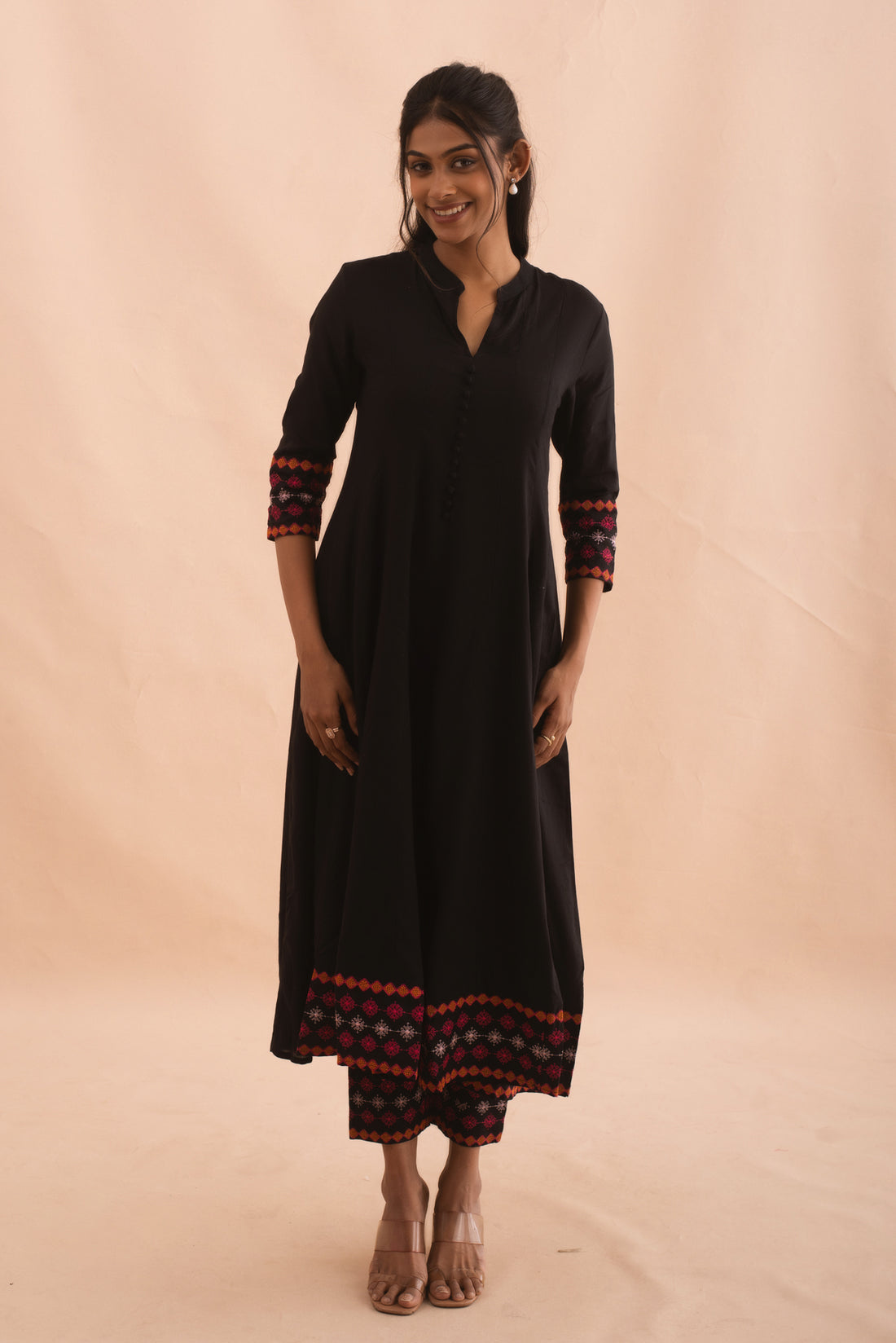 Embroidered Black Flared Kurta Set with Warm Accents