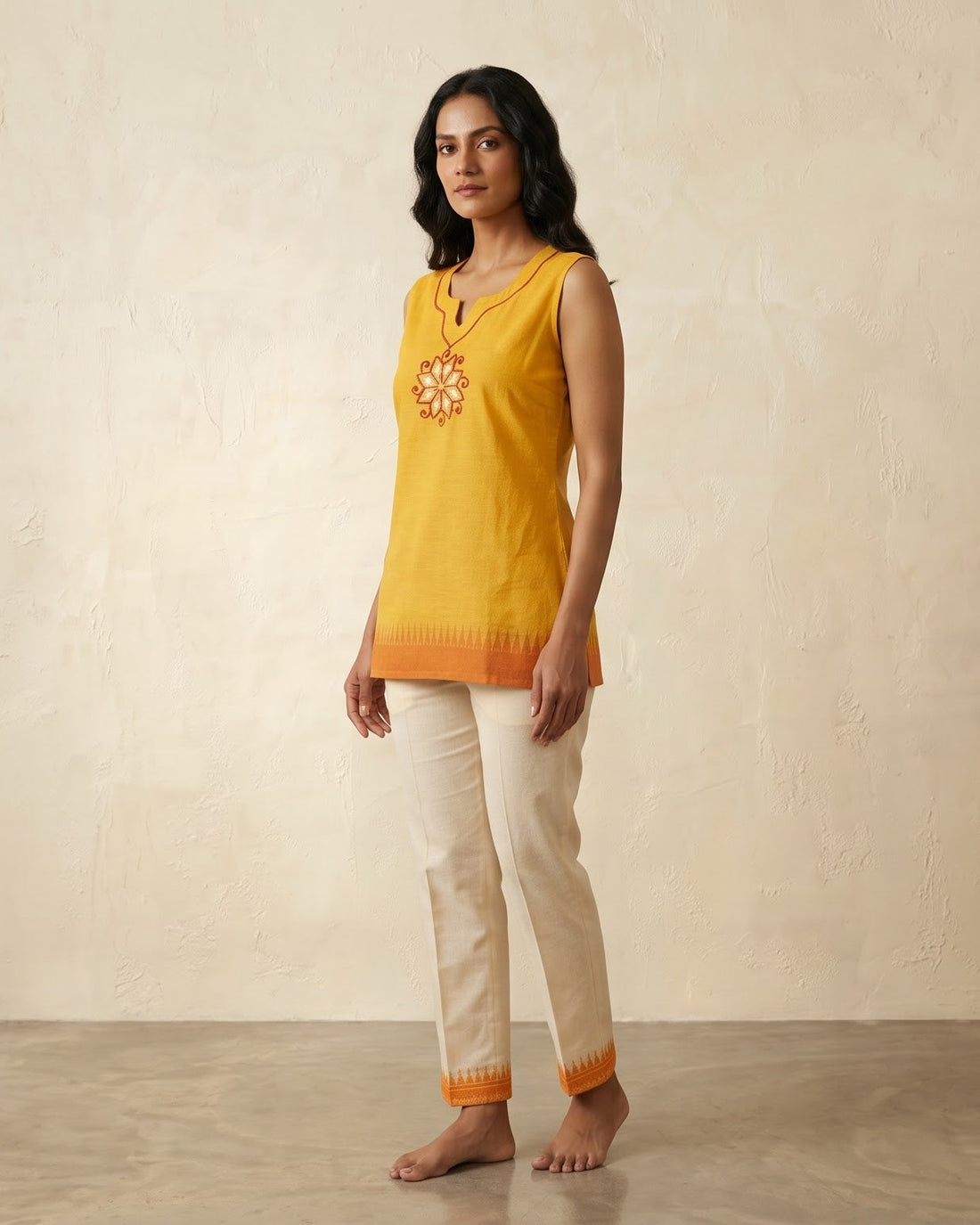 Sun Yellow Cotton Tunic with Floral Embroidery & Temple Border ( Sleeve available)